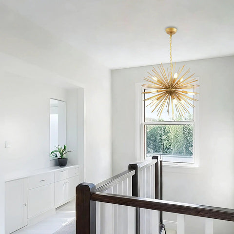 Golden Sputnik Chandelier Nine Lights Modern Starburst Fixture hanging in hallway room, solid metal design mid-century style.