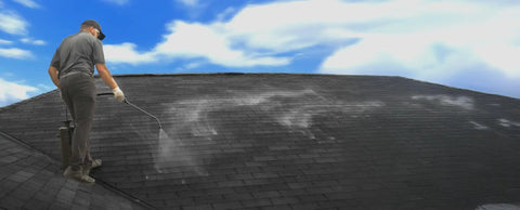 Professional applying Heavy Duty Clear Acrylic Roof Coating For Asphalt Shingles And Slate Sealer Waterproof Shield 4.75 Gallon on a roof.