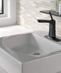 Vesna Single Hole Bathroom Faucet With Single Handle Chrome Finish Fits 1 Hole Or 3 Hole Sinks With Deck Plate Includes Matte Black Pop Up Drain Assembly And Worry Free Drain Catch in a modern bathroom.