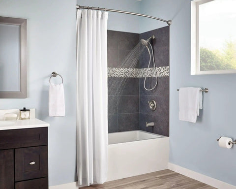 Modern bathroom with brushed nickel shower curtain rings and double hooks on a curved rod, smooth glide ball bearing rings.