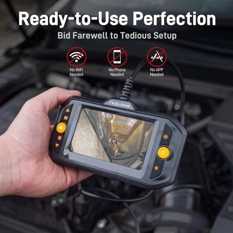 Hand holding Dual Lens Endoscope With Light For Auto HVAC Wall And Home Inspections Mechanic Borescope Camera Flexible Probe.