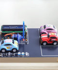 DIY Smart Parking System Soldering Kit For Teens And Students Learn Circuits And Logic Control By Building A Mini Car Parking Lot Simulation Model For Hands On Learning And Real World Practice In Tech Education, showing miniature cars on circuit board.