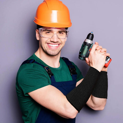 Worker wearing Three Pairs Of Heavy Duty Arm Protectors For Thin Skin And Bruising Cut Resistant Forearm Sleeves Level Five Burn Protection
