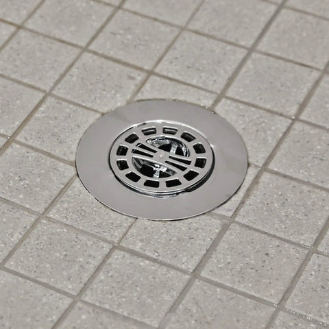 Shower floor with drain covered by Hair Catcher Baskets Black Set Of 3 For Shower Drains Stop Hair And Debris From Clogging Your Drain Durable