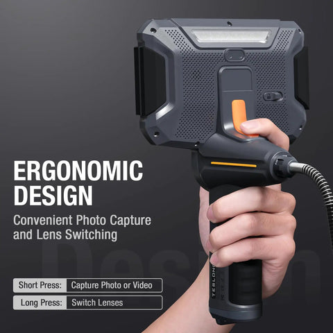 Hand holding Four Way Articulating Borescope With Dual Lens Endoscope, ergonomic design, shows controls and flexible probe connection.