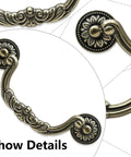 Close-up of 4 Pack Vintage Drop Bail Drawer Pulls Antique Bronze Cabinet Handles with floral design and 5-inch hole spacing.