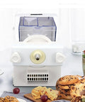 Automatic Cookie Press Machine With Eight Replaceable Nozzles, Electric Biscuit Maker on kitchen counter with cookies