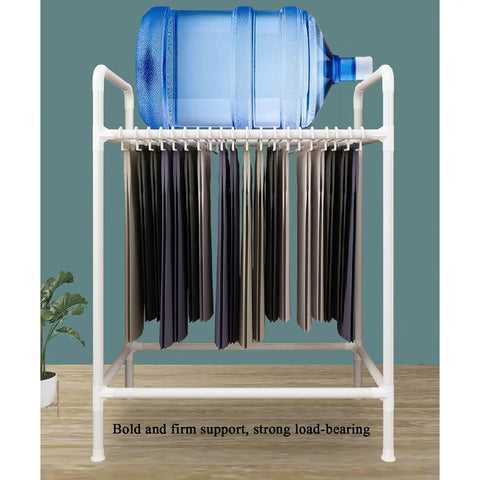 Space Saving Trouser Rack With 15 Heavy Duty Pants Clips And Smooth Wheels, holding trousers and supporting a water bottle.
