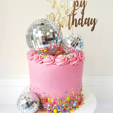 Pink cake with 11 Piece Disco Ball Cake Decorations Set With Mirror Ball Toppers For Cakes And Party Tables Includes 4 Sizes 8cm 6cm 4cm 2cm