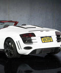 Rear view of a white sports car with license plate mounted using Black Stainless Steel License Plate Bolts Kit for Cars