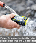 Disto X1 Laser Distance Meter With 330 Ft Range, Bluetooth 4.2 And NFC Data Transfer To Disto Plan App, Add And Subtract Measurements For Pros, 4 Line Display, IP65 Dust And Waterjet Protection, 6 Ft Drop Tested, Includes Hand Loop And Pouch. in hand under running water