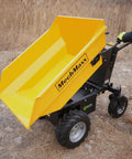 Electric Mini Dumper 1100Lbs Capacity Wheel Barrow With 48V Brushless Motor on uneven ground, ready for hauling materials.