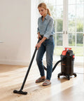 Woman using the 8 Gallon Wet Dry Shop Vacuum With 4.5 Peak HP Portable Grab And Go Power One Button Self Cleaning Dual Filter System 900W