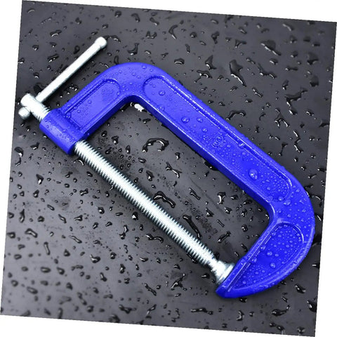 Close-up of 4 Inch Thickened Metal C Clamp With Quick Release For DIYers And Home Improvement Projects on wet surface.