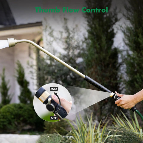 Extra Long 36 Inch Watering Wand With Thumb Flow Control in use near shrubs, highlighting metal nozzle and grip area.