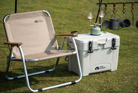 Camping scene with cooler secured using Rubber Flexible T Handle Hasp Draw Latch 2 Pack For Tool Boxes Coolers Golf Carts And Engineering Machine Hoods UV Resistant Self Aligning Noncorrosive Nonconductive Nylon Rubber Construction Black Finish.