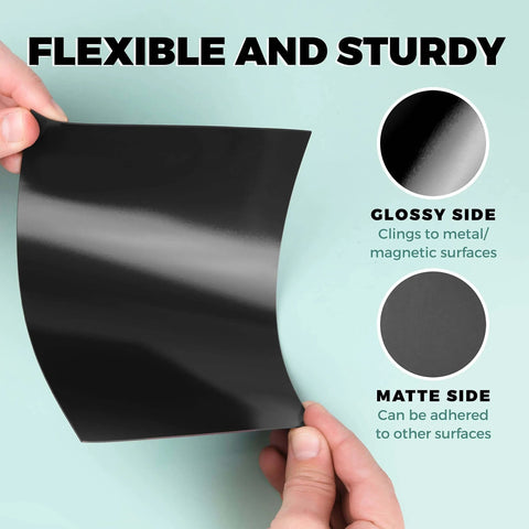 Hands holding a flexible black sheet showing glossy and matte sides, part of Pack Of 25 Non Adhesive Flexible Magnetic Sheets For Arts And Crafts.