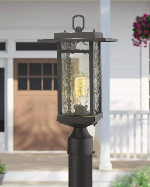 Dusk To Dawn Outdoor Post Light Set, 21-Inch Pier Mount Lantern with Oil Rubbed Bronze finish on Craftsman Style Aluminum Die-Cast shown in garden setting.