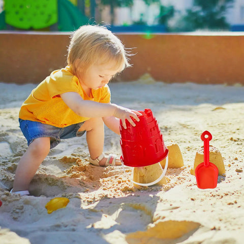 Child playing in sand with Six Pack 7 Inch Beach Sand Buckets And Shovels Set With Colorful Castle Molds For Sandbox Or Pool Party Favors