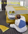 Auto body painter using Adhesive Masking Paper Roll No Fuss 20 Inch by 50 Feet for accurate car surface masking.