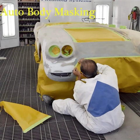 Auto body painter using Adhesive Masking Paper Roll No Fuss 20 Inch by 50 Feet for accurate car surface masking.
