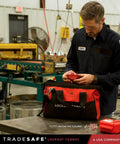 Heavy Duty Lockout Tagout Bag, Large LOTO Tool Organizer, Tough As Nails Industrial Safety Pouch on workshop table.