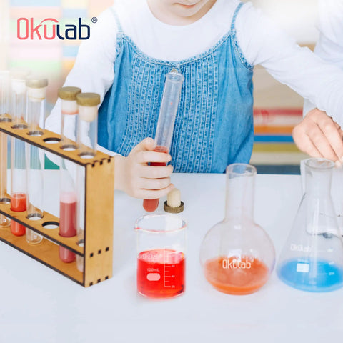 Children experimenting with test tubes and beakers, including the Low Form 500mL Glass Beaker Set 6 Pack Pro Grade Borosilicate 3.3.