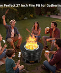 Group enjoying 27-inch fire pit, people roasting marshmallows and hotdogs, outdoor gathering with flames in center.