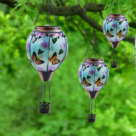 Hot Air Balloon Solar Lantern With Flickering Flame, butterfly pattern glass hanging in garden, 18 inch tall, on tree