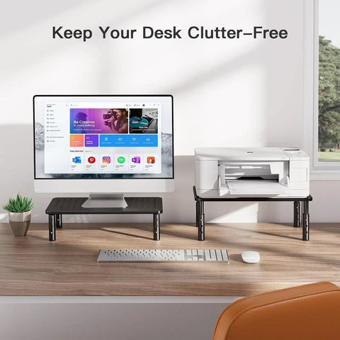 Dual Monitor Desk Stand With Height Adjustable Riser Laptop And Monitor Stand For Two Screens 14.5 By 9.1 Platform Under Desk Storage Black Two Pack Ergonomic Setup with a monitor and printer on a wooden desk.