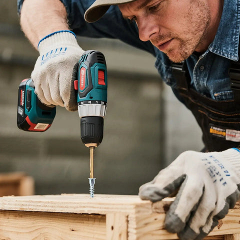 Person using a drill to insert a Heavy Duty M5x50 Hex Socket Countersunk Self Tapping Cabinet Screw into wood.