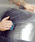 Person using Jhknnk 5pc Premium Dry Wet Sandpaper Set Featuring Tear-Resistant Silicon Carbide Sheets For Metal And Car Paint Sanding.