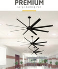 Heavy Hitting Two Pack One Hundred Inch Industrial Ceiling Fan With Remote Control Inside Or Outside Featuring Solid As A Rock Black Metal Blades And No Sweat Operation Covering Up To Four Hundred Square Feet Rooms in a spacious hallway.