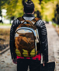 Dope Long Horn Brown Bull Print Backpack worn outdoors, unisex large capacity polyester daypack with zippered pockets.