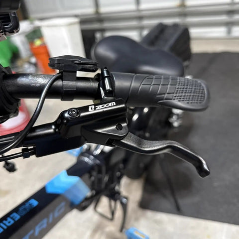 Close-up of handlebar and lever from EBike Hydraulic Disc Brake Set With Power Off Sensor 2 3 Pin Compatibility