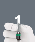 Hand holding the 416 R T-Handle Rapidaptor Bit Holder for quick change and one-handed screwdriving, showing magnetic retention