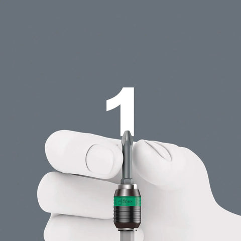 Hand holding the 416 R T-Handle Rapidaptor Bit Holder for quick change and one-handed screwdriving, showing magnetic retention