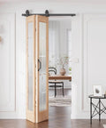 Premium Built To Last Heavy Duty Bi Fold Barn Door With Frosted Glass Cross Design Preassembled 36 By 84 Inches open in room