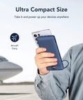 Person holding All In One Portable Charger With Built In AC Plug And Cables, 10000mAh Ultra Slim Power Bank For Travel, in navy color.