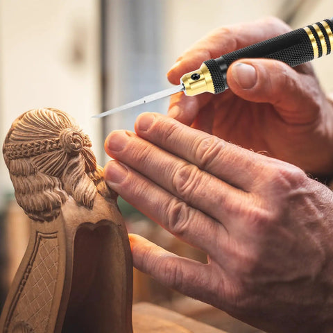 Close-up of hands using Hardcore Tungsten Steel Scribing Chisel Set Featuring Seven Ultra Slick Blades Spanning Point One To Two Millimeters.