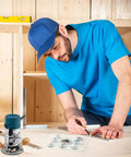 Man using a router with 8 Piece Router Template Guide Bushing Kit With Dovetail And Hinge Jigs For Smooth Woodworking Edge Trimming Compatible With Bosch Models Giving You Zero Sweat Precision Daily.