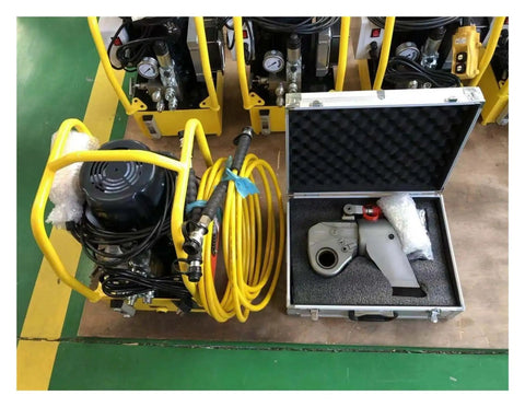 Badass Hydraulic Torque Wrench With 1.5 Inch Square Drive Aluminum Titanium Alloy Build For Serious Bolt Tasks No Drama Fastener Rig That Truly Works Hard On Job Sites in storage case with hydraulic pump and hose.