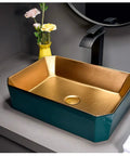 Top Shelf Ceramic Vessel Sink For Bathroom Countertops, Slick Polished Porcelain Art Basin With Built Tough Scratch Guard, Fuss Free Daily Cleanup, Practical Above Counter Vanity Wash Bowl in teal and gold on a countertop.