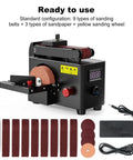 Heavy Hitter 200W Mini Belt and Disc Sander Produces 8500RPM with belts, sandpaper, and yellow sanding wheel for versatile use.