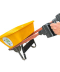 Person using Pivoting Wheelbarrow Handles Pro Grade Heavy Duty Ergonomic Nylon Grips Built In USA For Easy Dumping And Total Control