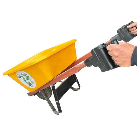 Person using Pivoting Wheelbarrow Handles Pro Grade Heavy Duty Ergonomic Nylon Grips Built In USA For Easy Dumping And Total Control