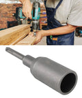 Heavy-Duty Sds Plus Hammer Drill Ground Rod Driver Bit Forged Steel T Post Stake Driving Tool With Multi-Purpose Electrical Rebar Sign Post Installation Accessory 65Mm in use with a drill on wood.