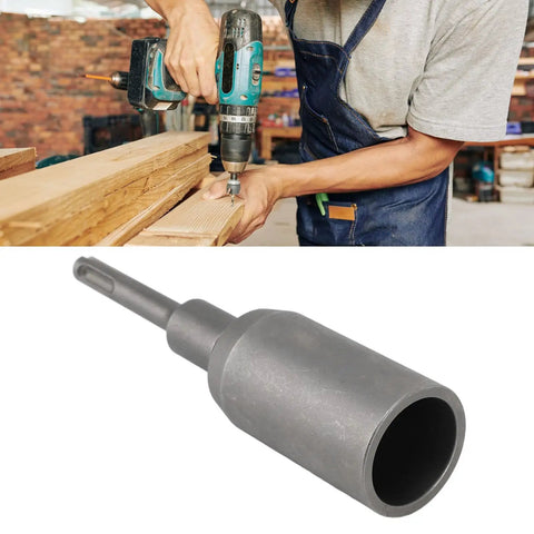 Heavy-Duty Sds Plus Hammer Drill Ground Rod Driver Bit Forged Steel T Post Stake Driving Tool With Multi-Purpose Electrical Rebar Sign Post Installation Accessory 65Mm in use with a drill on wood.