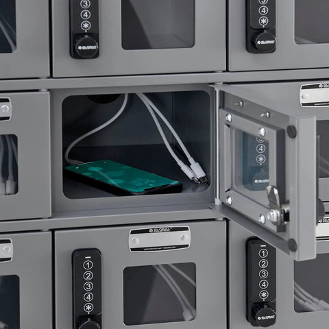 Secure 24 Door Clear View Cell Phone Charging Locker With Usb C Micro Lightning Ports For Offices Classrooms Ultimate Gear Vault And No Stress Charging Setup with open door showing a phone and charging cables inside.