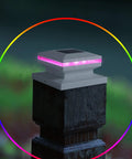 6 Pack Solar Post Lights Outdoor RGB Color Changing Post Cap Lights for fence deck and patio on a wooden post with pink glow